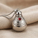 Solace Keepsake Pendant - Garnet Accent