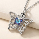 Butterfly-shaped pendant with a blue gem on a beige background